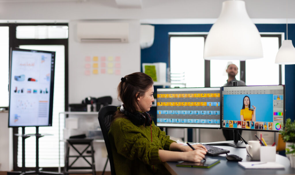 A person working on video to create a video subtitling