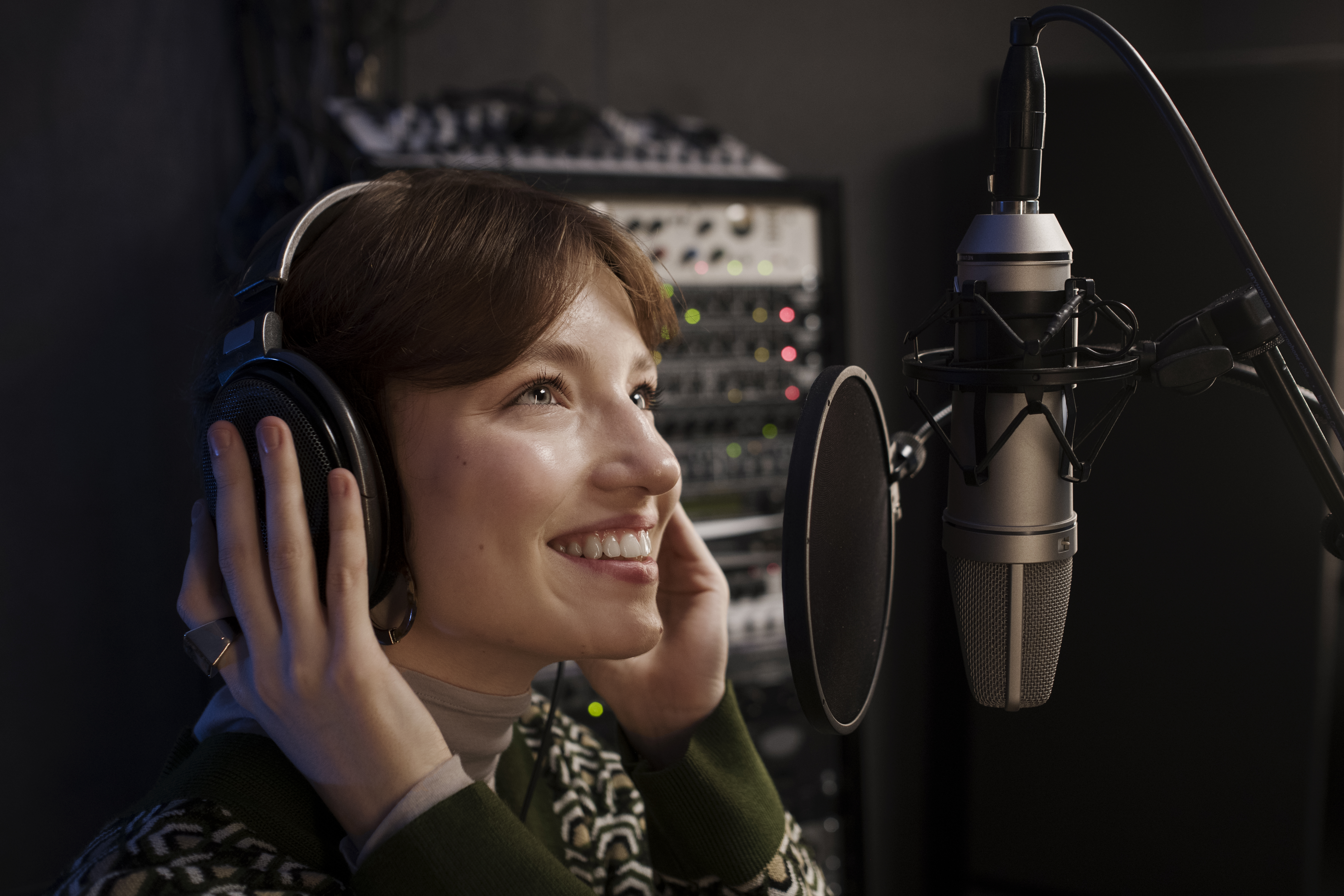 A person to implement the Voice-Over Trends: What's New and Exciting in the World of Audio Narration.