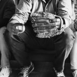 Friends watching sports in the living room