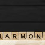 The word harmony spelt with wooden letters