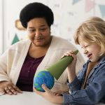 Kids learning about planets in classroom