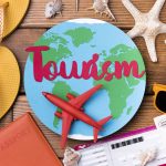 Top view world tourism day with lettering