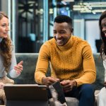 Multiracial group of people discussing business in an office
