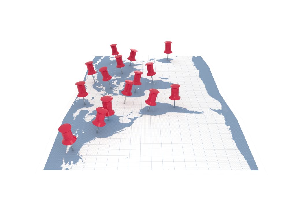 Books and stories flowing across world map borders representing cultural understanding through cross-border narrative exchange