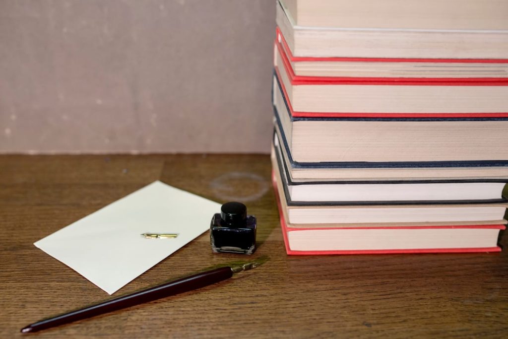 A lawyer's desk with a legal pad, a stamped summons and a Thai-language translation set side by side - Real Story: Translating a featured image
