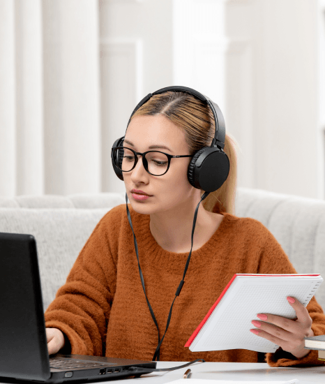A student replays an interview and compares notes with dissertation transcription services for strong research accuracy.