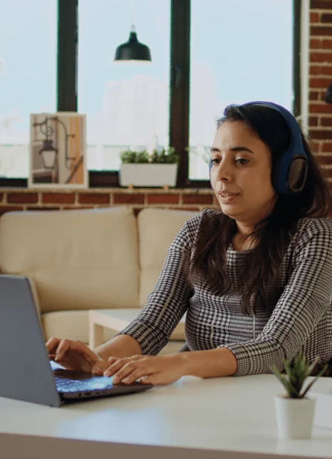 A project manager tracks Media Localization Services for 100 languages on a dashboard, coordinating fast delivery.