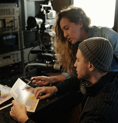 A QA team checks subtitles, timing, and cultural tone on a monitor, ensuring professional Media Localization Services.